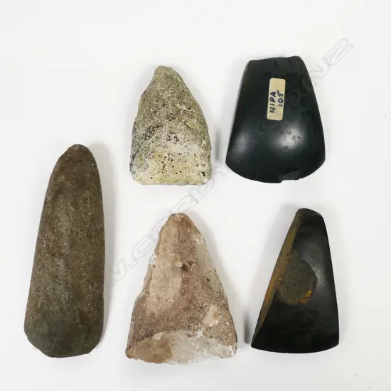 Five early pacific and other stone adze blades,